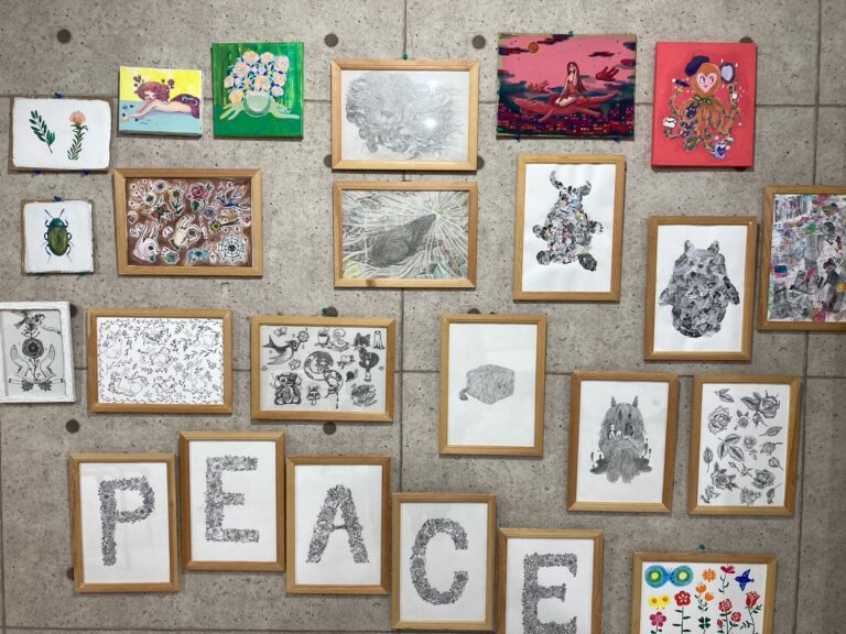 Framed illustration artworks by Kotori/KTR displayed on a wall