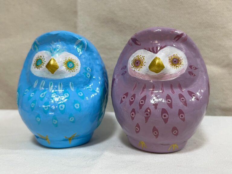 Blue and purple owl Daruma art pieces by Kotori/KTR, side by side