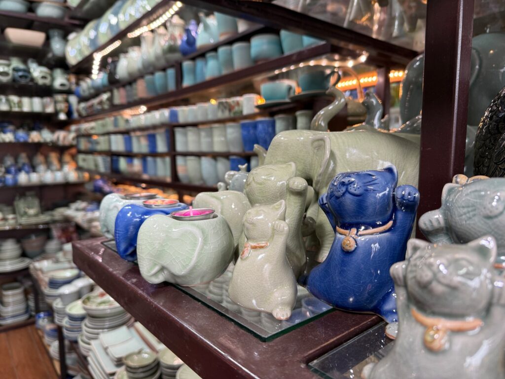 Cat and elephant ceramic figures at Celadon Shop
