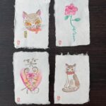 Illustrated Yanagiu washi postcards in four designs.