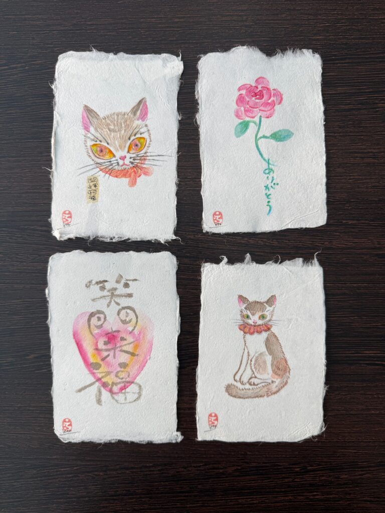 Illustrated Yanagiu washi postcards in four designs.